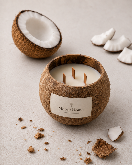 Coconut Shell Candle, unlit, with coconut pieces on a neutral background