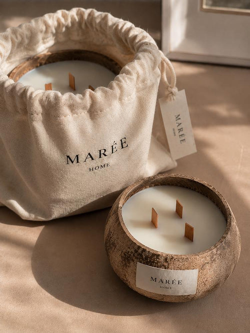 The Marée gift set with two coconut shell candles and matches